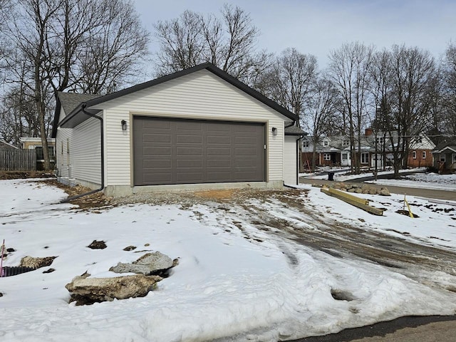 view of snow covered garage