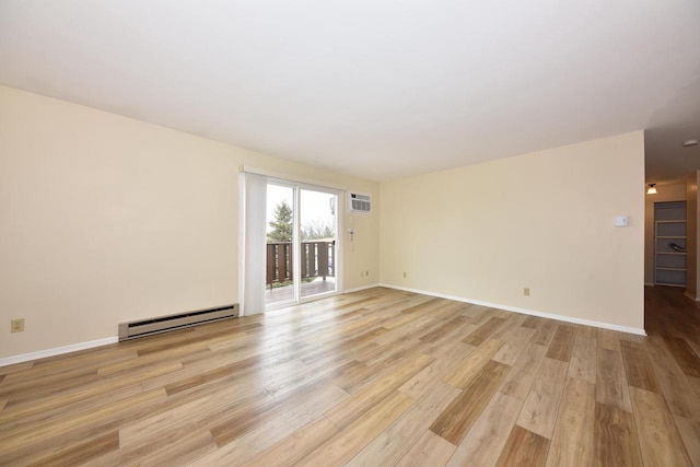 empty room with light wood-style floors, baseboards, a wall mounted air conditioner, and baseboard heating