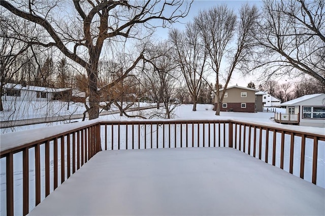 view of snow covered deck