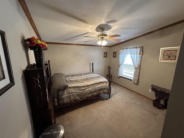 bedroom with light carpet, ceiling fan, baseboards, and crown molding