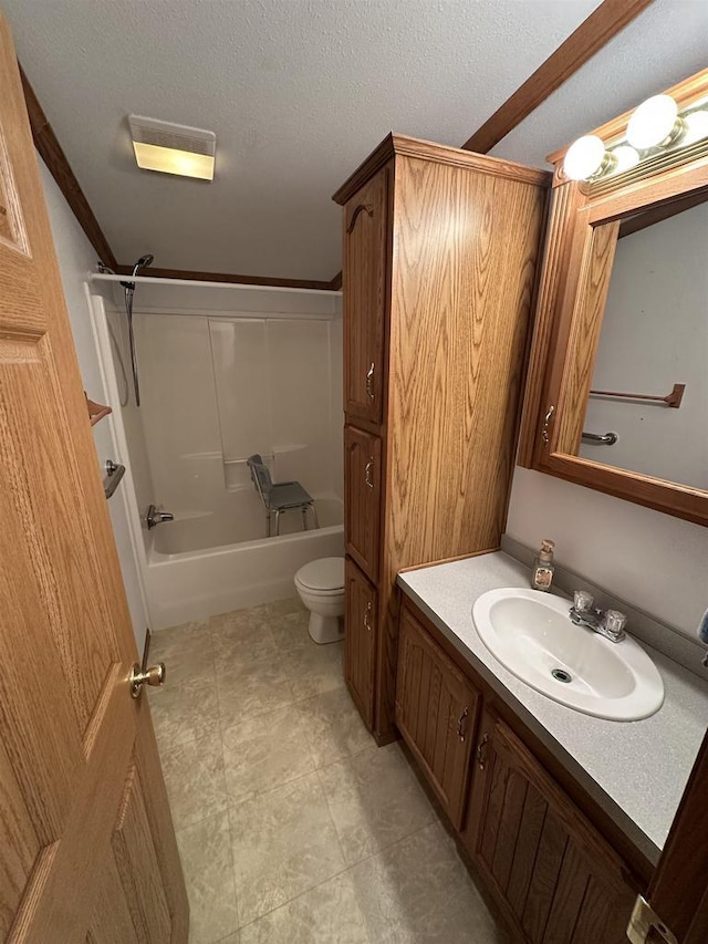 full bath with toilet, washtub / shower combination, a textured ceiling, and vanity