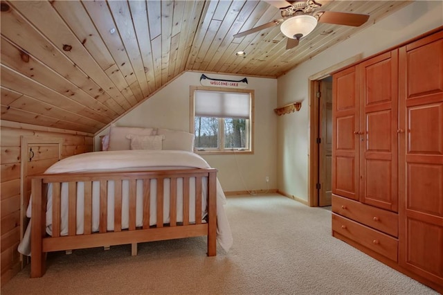 bedroom featuring light colored carpet, wood ceiling, vaulted ceiling, ceiling fan, and baseboards