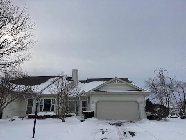 single story home with an attached garage