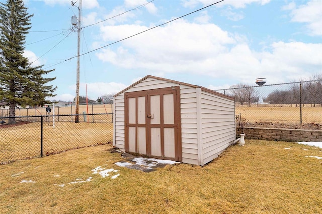 view of shed featuring a fenced backyard