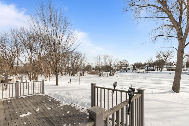 view of snow covered deck