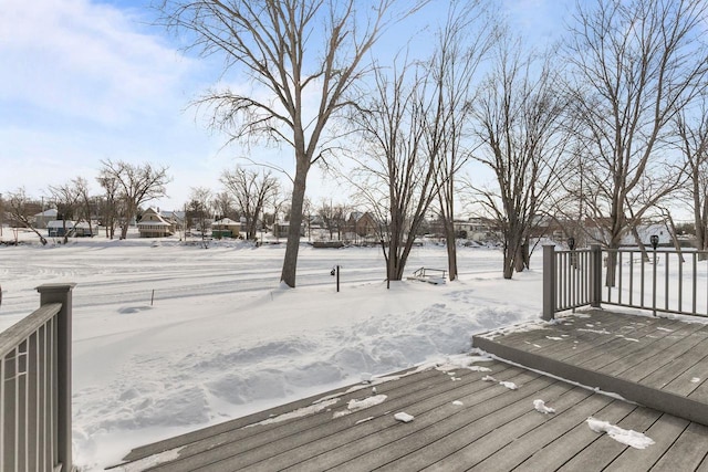 view of snow covered deck