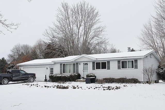 single story home with a garage