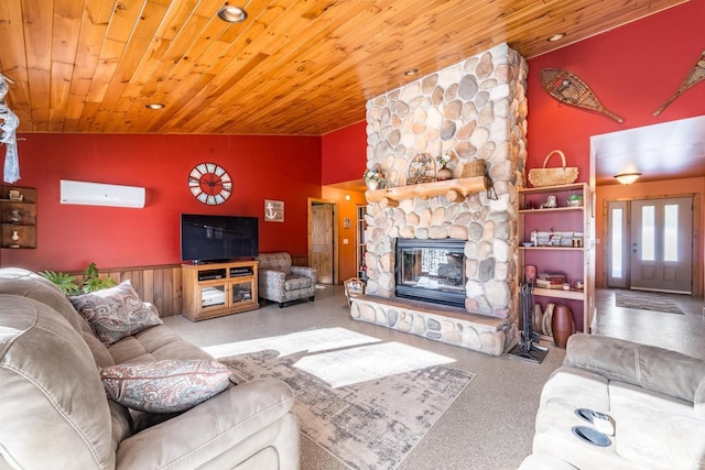 living area featuring high vaulted ceiling, wood ceiling, a wall mounted air conditioner, and a stone fireplace