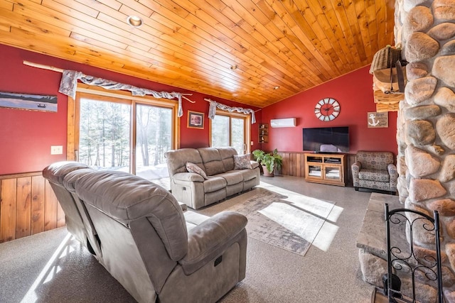 carpeted living area with wood ceiling, wainscoting, vaulted ceiling, wooden walls, and a wall mounted air conditioner