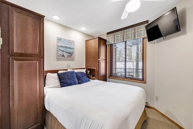 bedroom with carpet, ceiling fan, baseboards, and recessed lighting