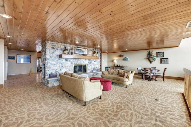 living area with light carpet, baseboards, wood ceiling, a fireplace, and recessed lighting