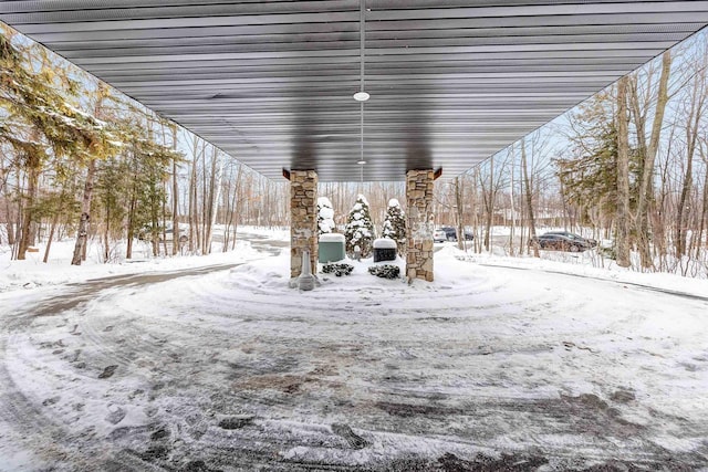 view of yard layered in snow