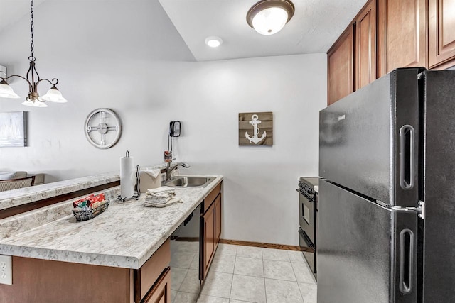 kitchen featuring a sink, black appliances, brown cabinetry, and light countertops