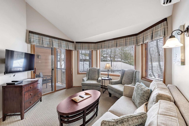 living area featuring light carpet and lofted ceiling