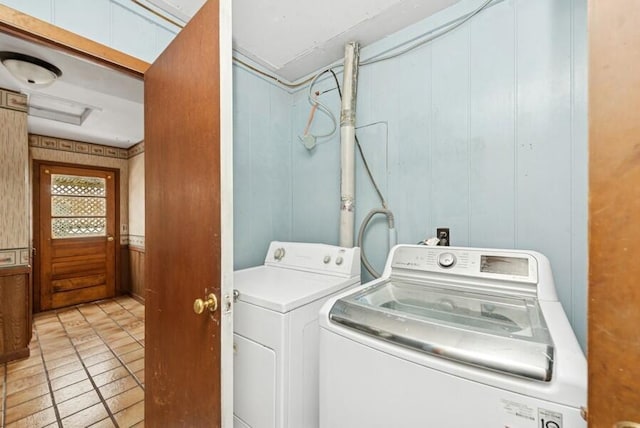 laundry area with separate washer and dryer