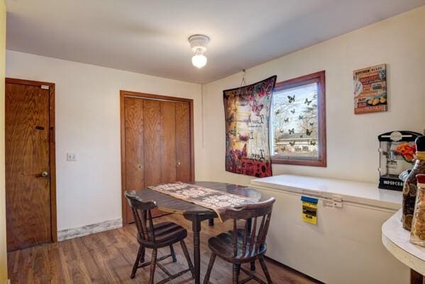 dining area featuring wood finished floors