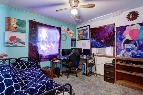 bedroom featuring ceiling fan and carpet flooring