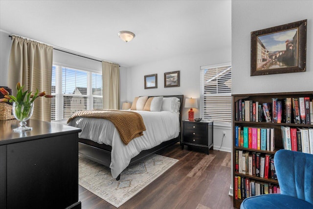 bedroom featuring dark wood-type flooring