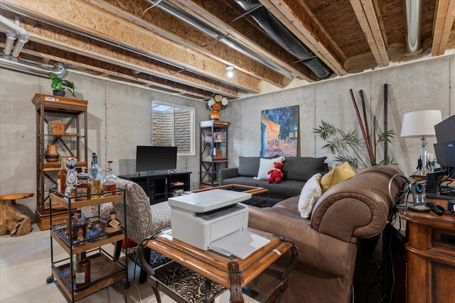 living room featuring concrete flooring