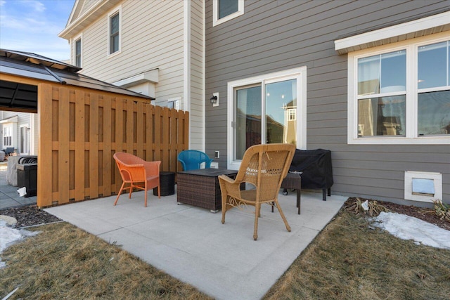 view of patio / terrace featuring fence