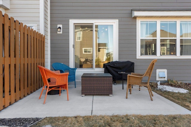 view of patio / terrace featuring an outdoor hangout area, area for grilling, and fence