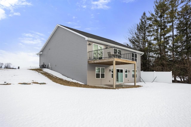 exterior space with central AC and a wooden deck