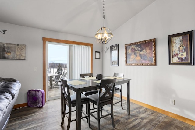 dining area featuring lofted ceiling, dark wood-style floors, baseboards, and a notable chandelier