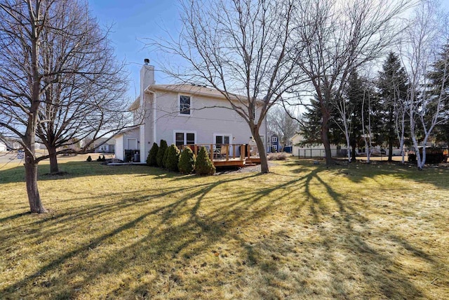 view of yard featuring a deck