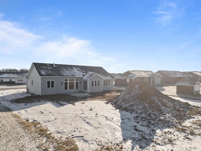 rear view of house with a residential view