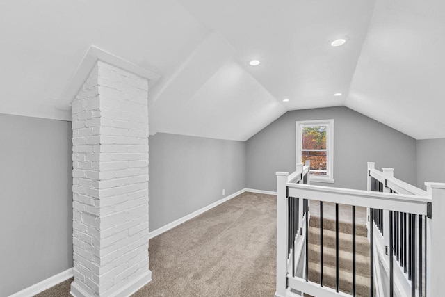 additional living space featuring recessed lighting, carpet flooring, vaulted ceiling, and baseboards