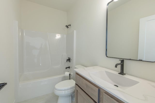 bathroom with vanity, toilet, and bathing tub / shower combination