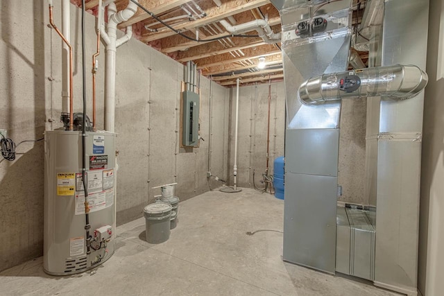 unfinished basement with heating unit, electric panel, and gas water heater