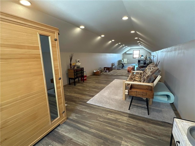 bonus room featuring dark wood-style floors, lofted ceiling, and recessed lighting