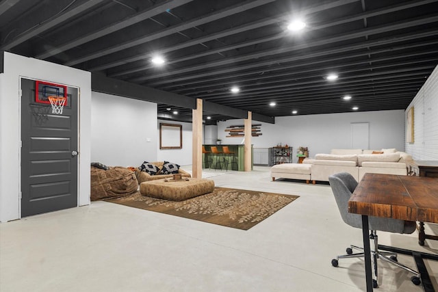 finished basement with recessed lighting