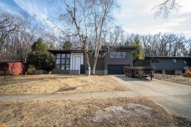 view of front of house featuring a garage and driveway