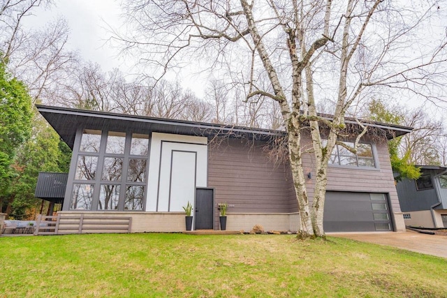 exterior space with an attached garage and concrete driveway