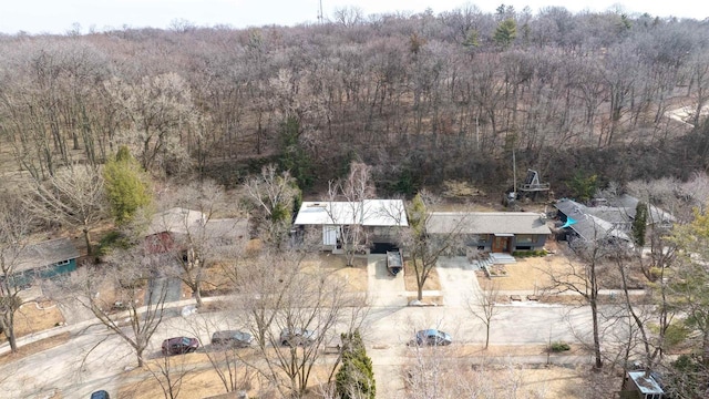 aerial view with a wooded view