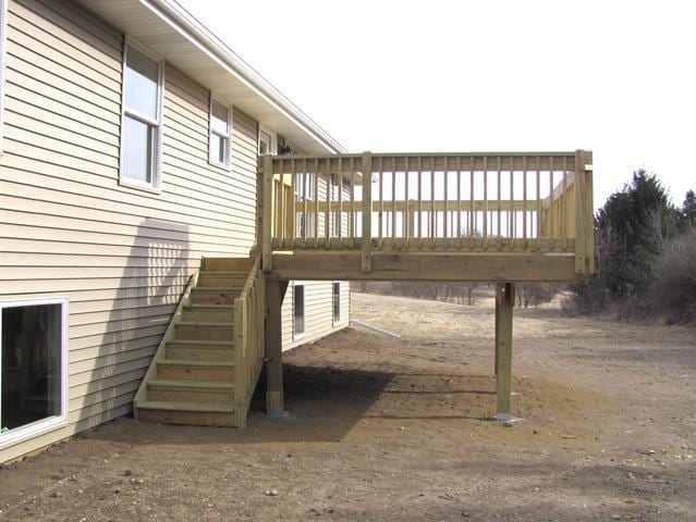 deck featuring stairway