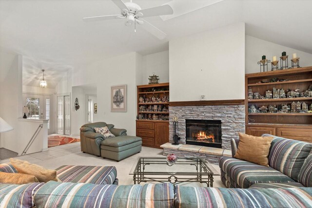 S32W32807 Bethania Ln, Dousman, WI 53118 - living room featuring lofted ceiling, a fireplace, and a ceiling fan