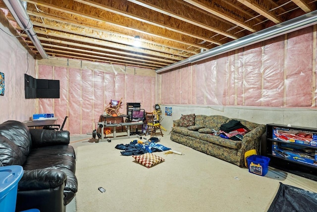 living area featuring concrete floors