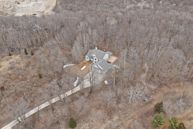 aerial view with a wooded view