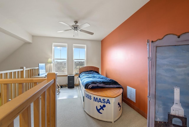 bedroom with vaulted ceiling with beams, carpet flooring, visible vents, and a ceiling fan