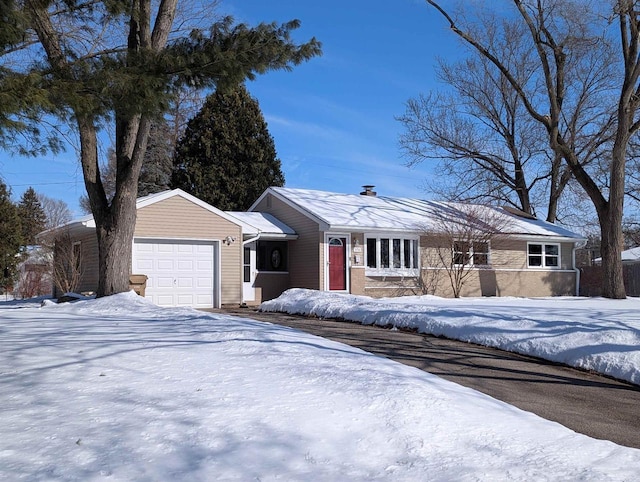 single story home with an attached garage