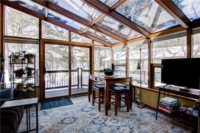 sunroom / solarium with vaulted ceiling and plenty of natural light