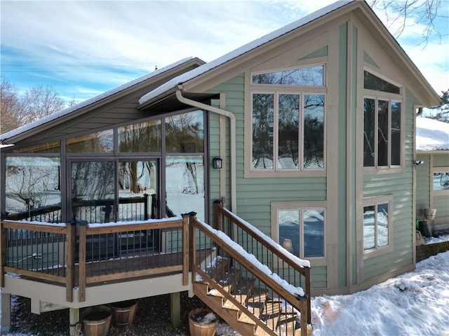 exterior space featuring a sunroom