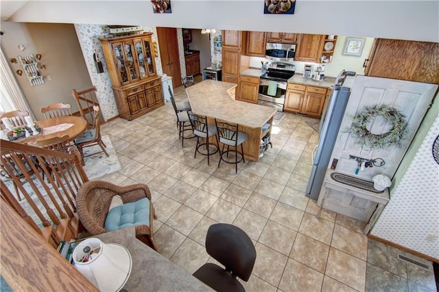 dining room with light tile patterned flooring