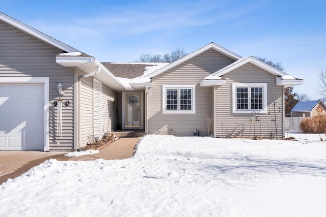 single story home with an attached garage