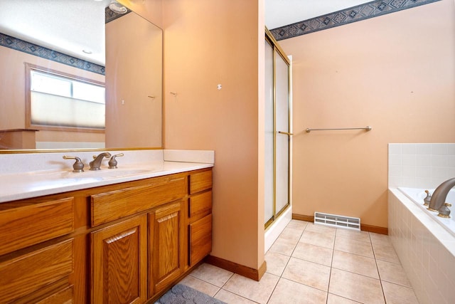 full bathroom featuring visible vents, a shower stall, tile patterned flooring, vanity, and tiled tub