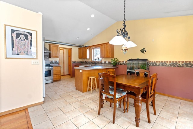 dining space featuring lofted ceiling, light tile patterned floors, baseboards, and recessed lighting