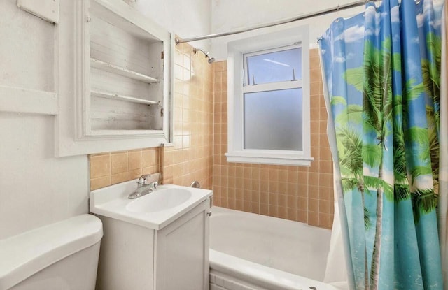 bathroom with shower / bath combination with curtain, decorative backsplash, vanity, and toilet